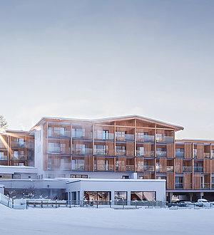 Das Hohe Salve Sportresort Außenansicht im verschneiten Winter